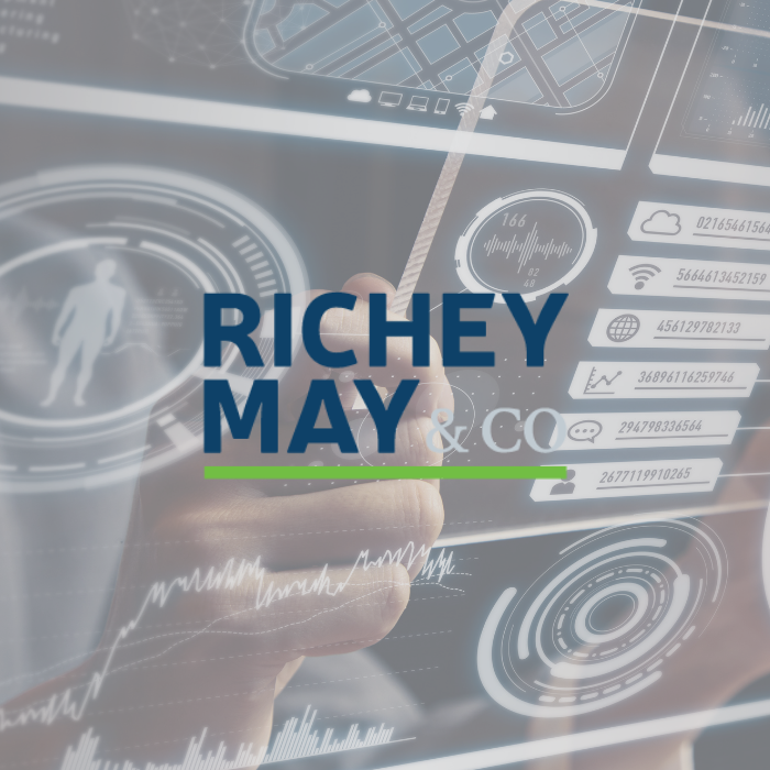 Basic Blog Roll Image (22) Richey May & Co title with background of a man manipulating software